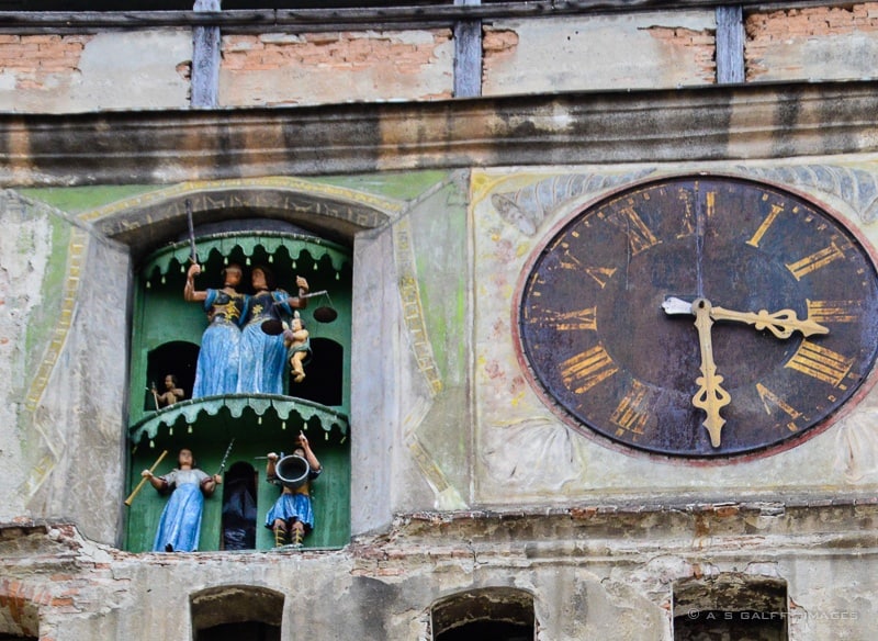 the wooden figurines of the dial clock in Sighisoara
