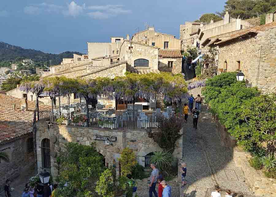 strolling through the old town, one of the best things to do in Tossa de Mar