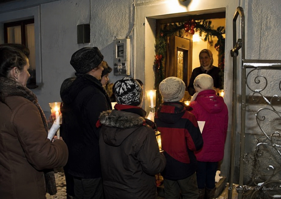 Carolers visiting the neighborhood houses to sing carols, an old Romanian Christmas Tradition.