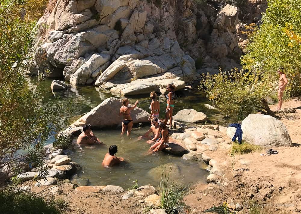 people soaking in the Deep Creek Hot Springs