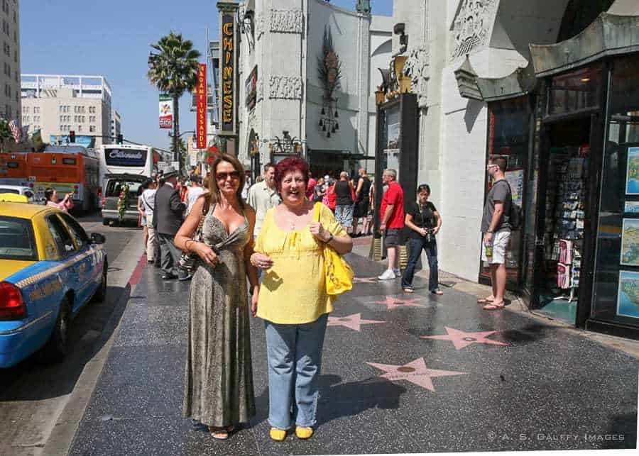 Walking along the Hollywood Walk of Fame