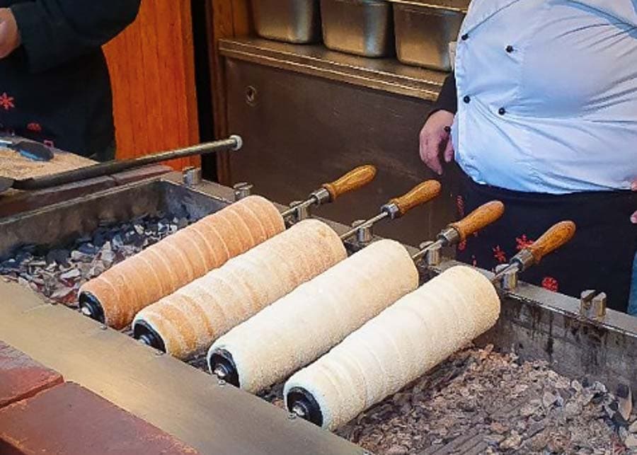 Eating chimney cake in Budapest in winter