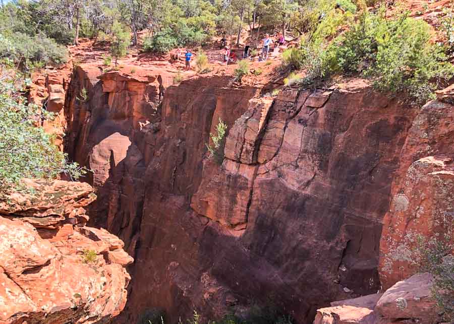 People admiring the view from the top of the Devil's Bridge Trail Sedona