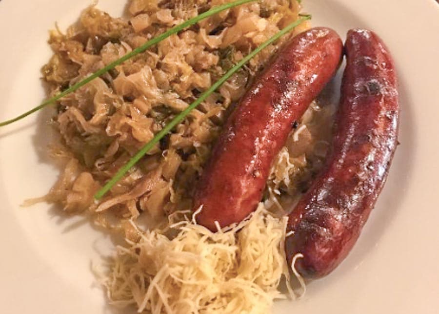 Roasted Sausages with Sauerkraut a traditional Romanian food
