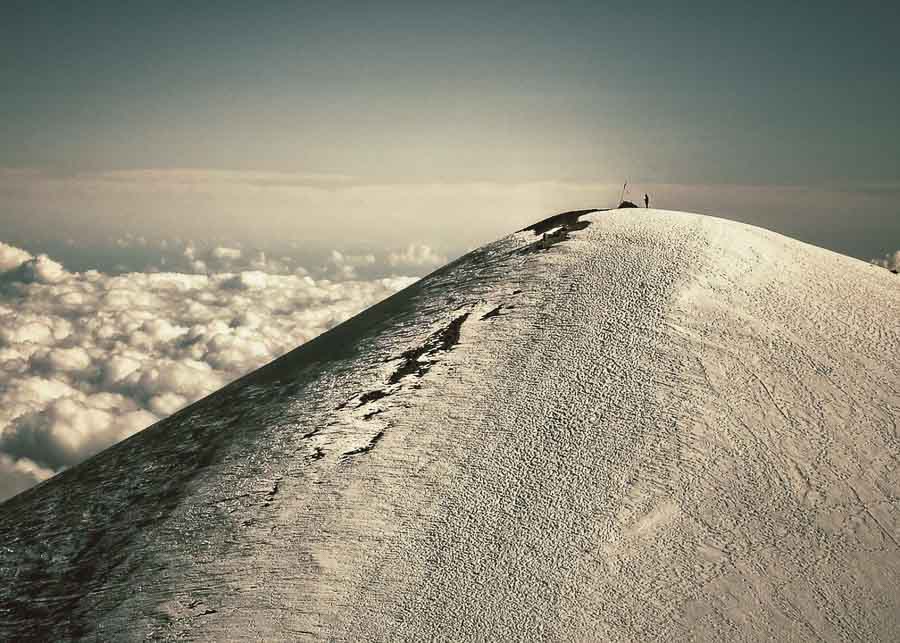 snow on the mountains on the Big Island vs warm weather in Maui