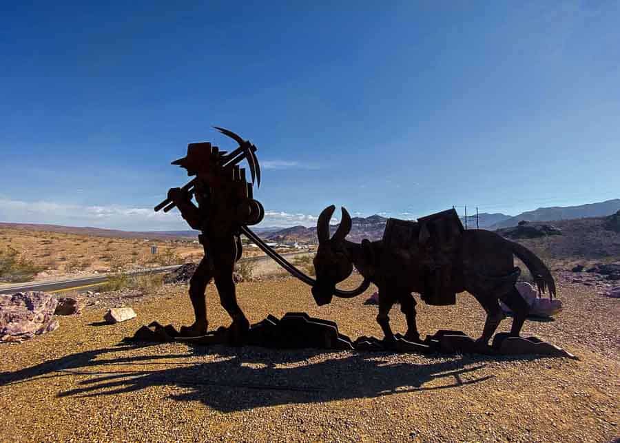 Statue representing a prospector and his donkey passing through Death Valley