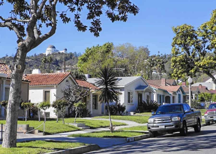 Street in Los Angeles with a view of the Griffith Observatory in the background