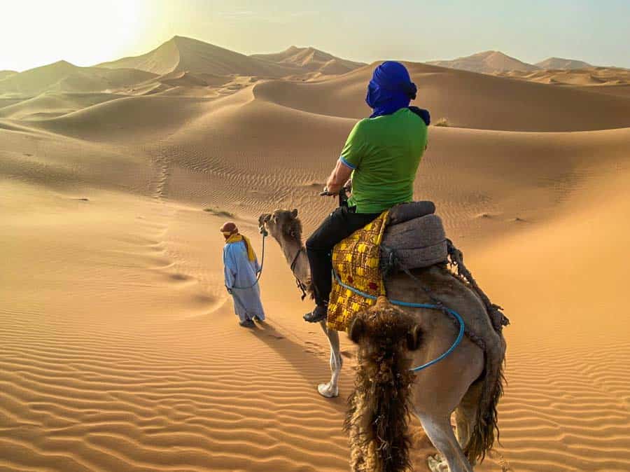 Riding the camel in Erg Chebbi desert