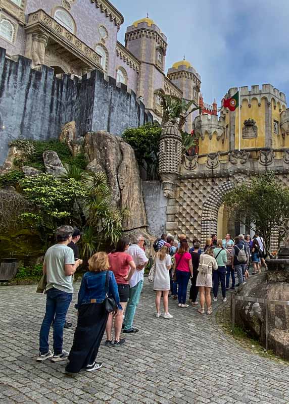 People standing in line to get inside the Pena Palace 