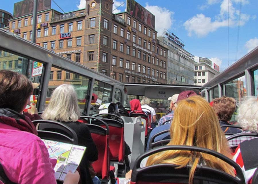 riding the hop-on ho-off bus, one of the best things to do in Copenhagen