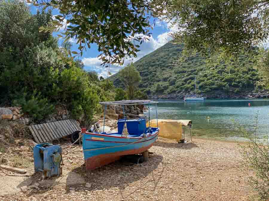 Fishing boat on a quiet beach in Ithaca Island, Greece