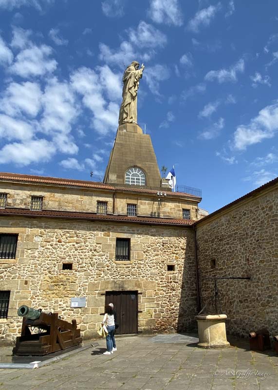 View of Christ Statue at the top of Mount Urgull