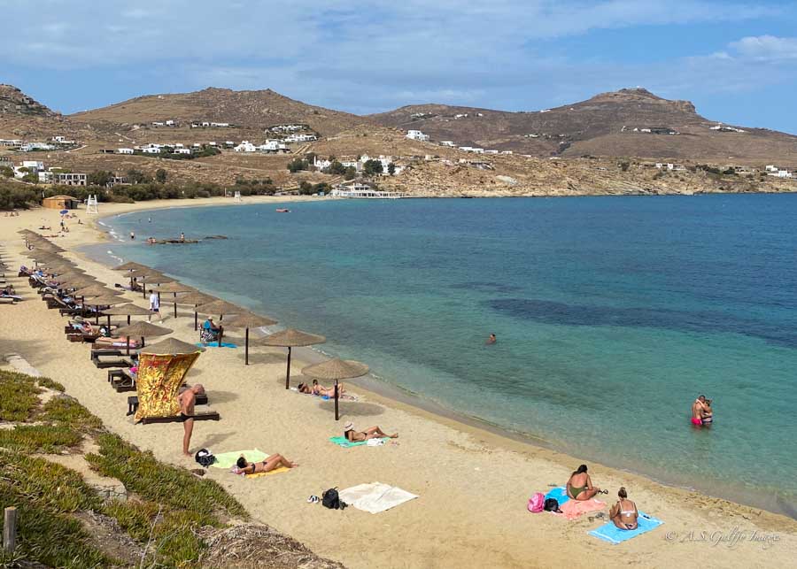 A crowded beach image in Mykonos