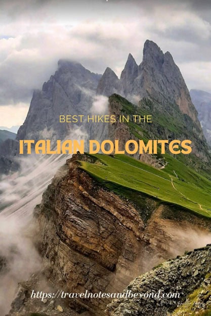 Scenic view of the Italian Dolomites with rugged peaks and lush green trails.