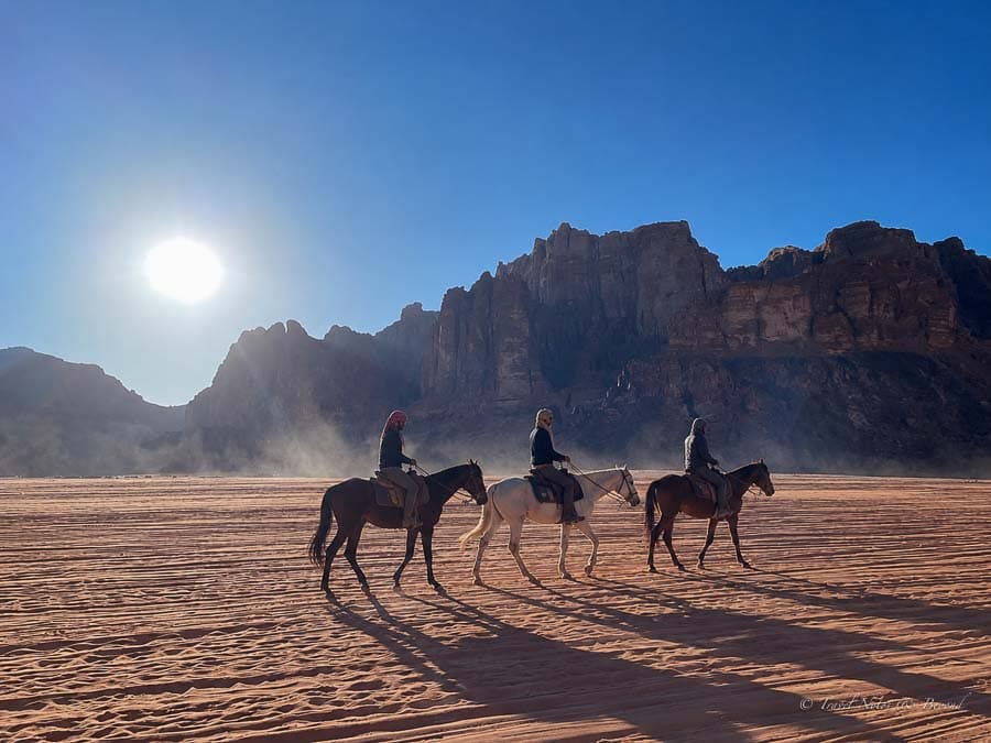 horseback riders in Wadi rum