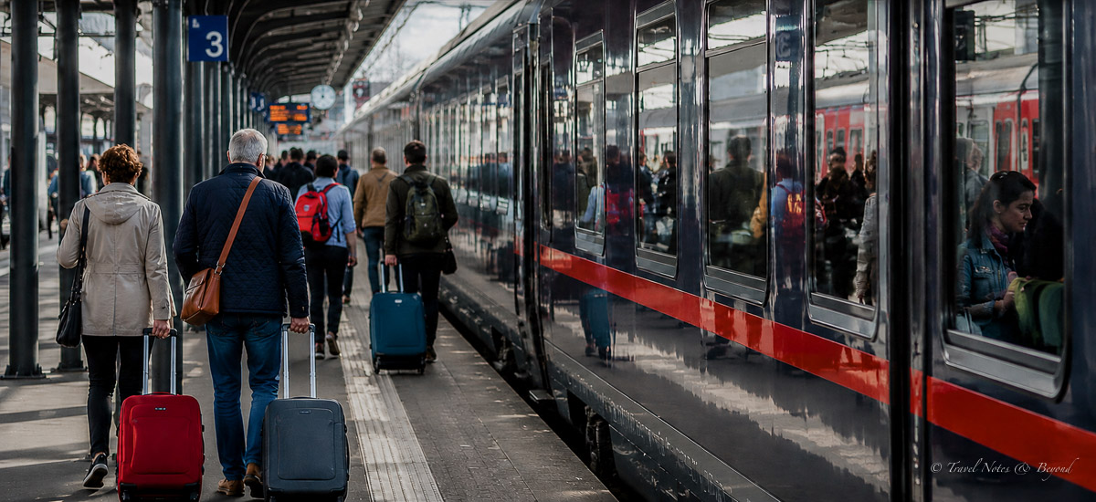 people traveling by train