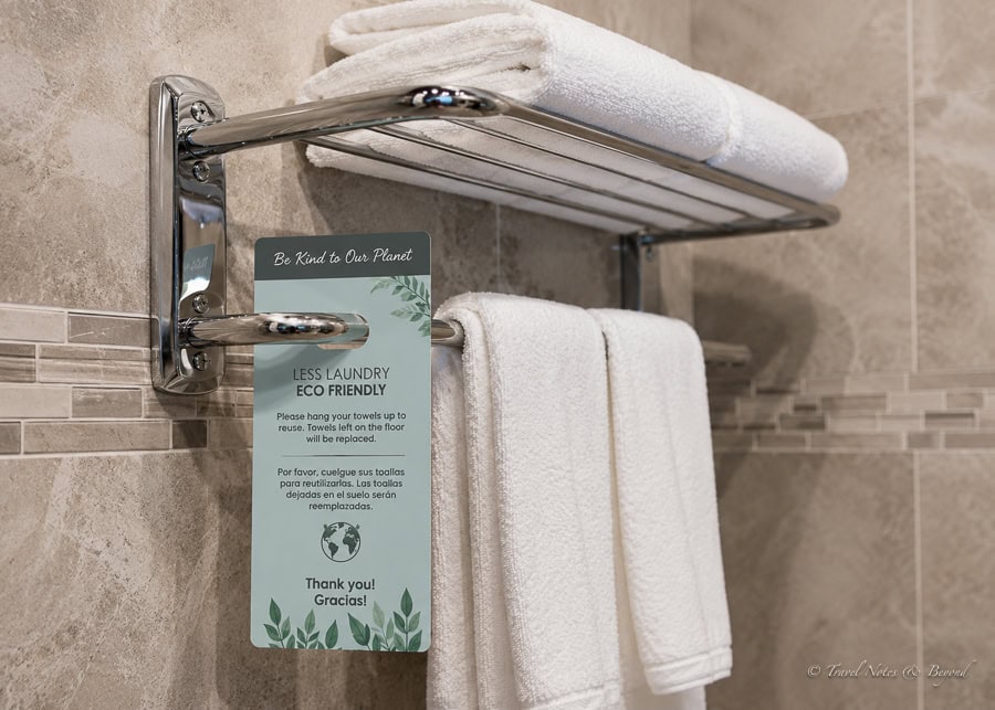 Towels hanging on the towel bar in an eco-friendly hotel